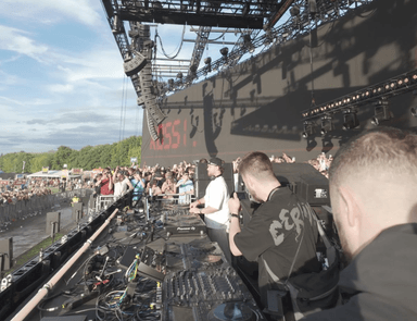A crowd at an outdoor stage